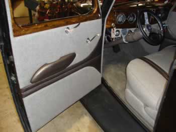 Tweed and leather on the door panels